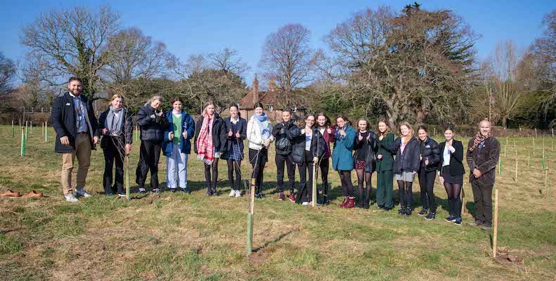 Staff and Pupils at Bede's School after planting
